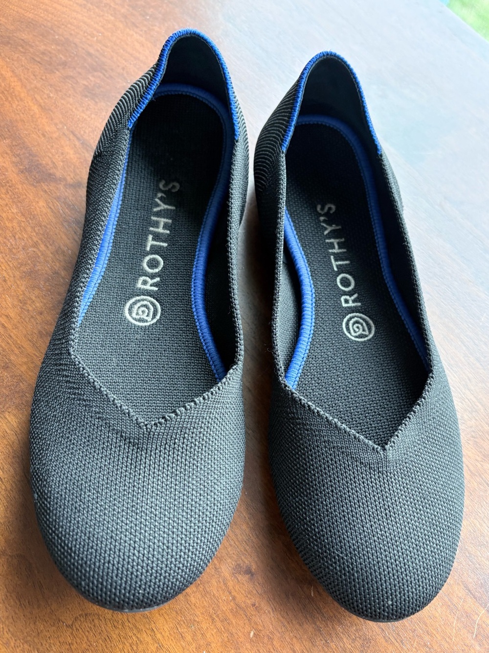 Rothy's Women's Black Knit Ballet Flat with Blue Trim - size 8